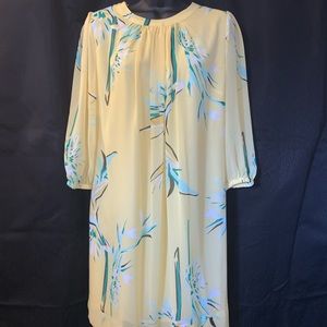 Yellow knee length shirt dress